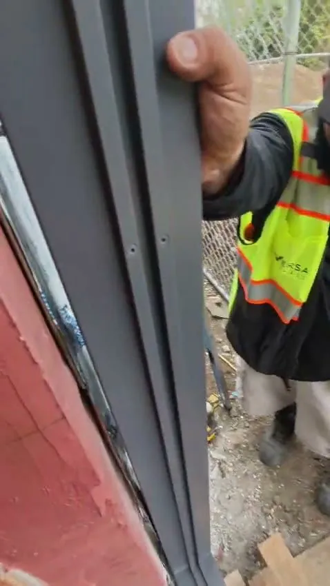 Versa Glass Co. crew installing a commercial entrance in Los Angeles