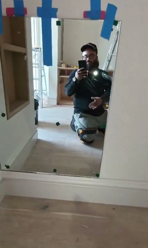 Bathroom vanity mirror installation in a Los Angeles home