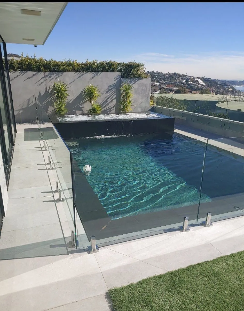 Spigot-mount glass pool fence on a hillside Los Angeles property