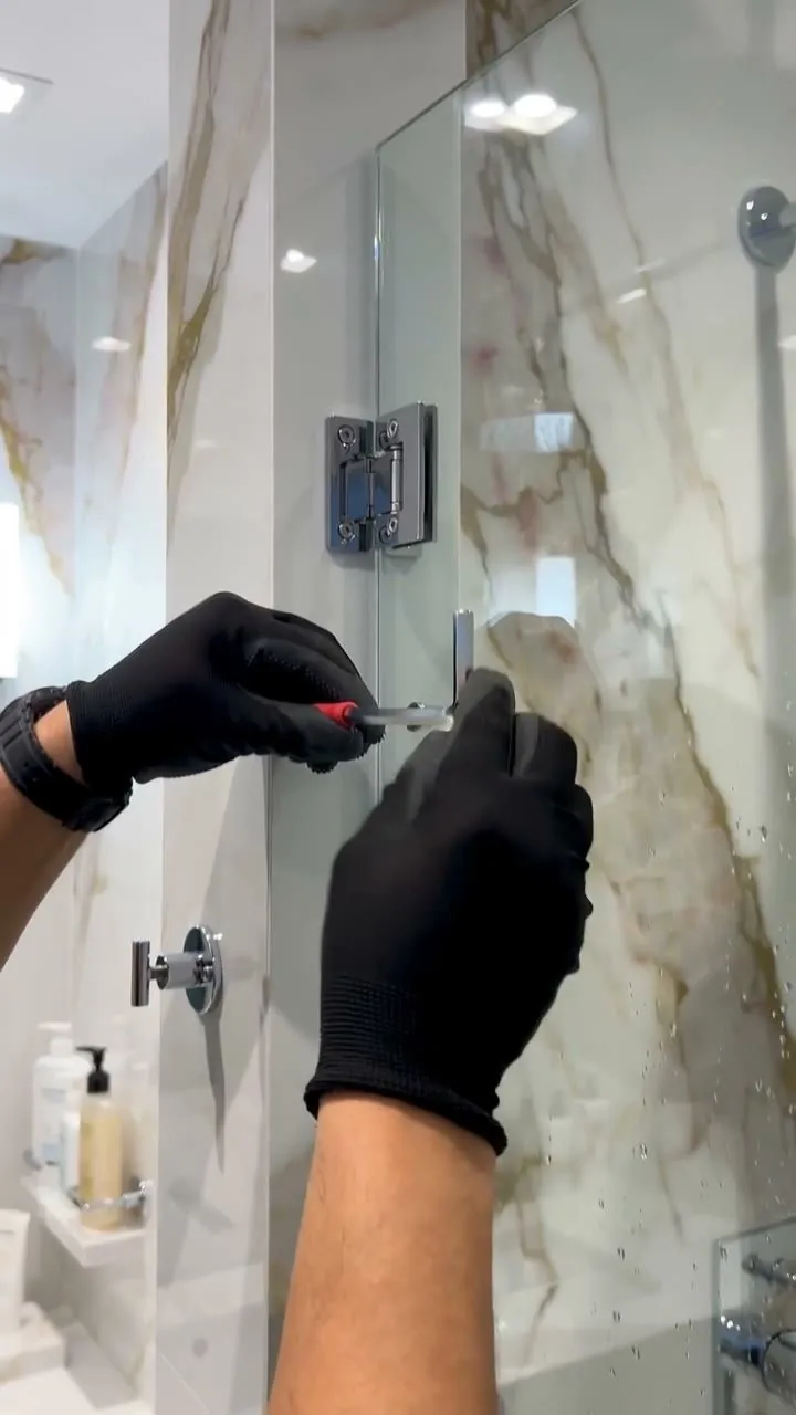 Shower door hinge service in a Los Angeles bathroom