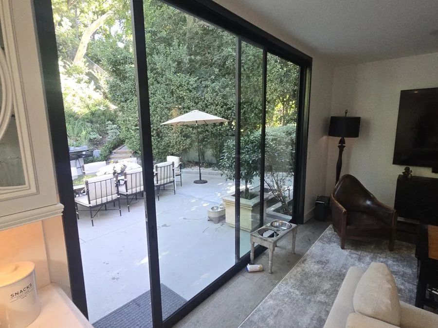 Fleetwood sliding door wall installed by Versa Glass Co.