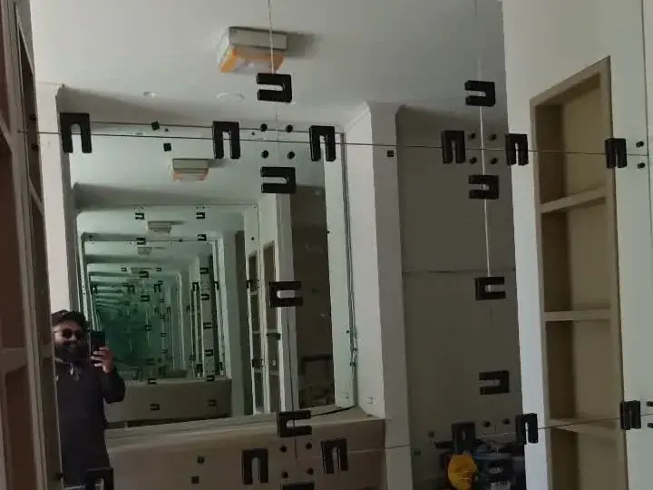 Custom mirror wall installation in progress in Los Angeles