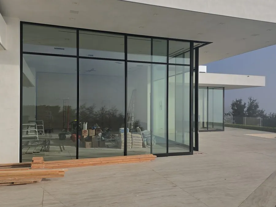Modern storefront and curtain wall glazing by Versa Glass Co.
